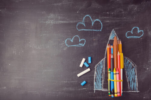 drawing of a rocket on a chalkboard